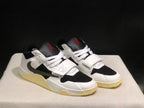 Three-quarter view of the pair highlighting the white upper, black panels, white laces, and contrasting outsole.