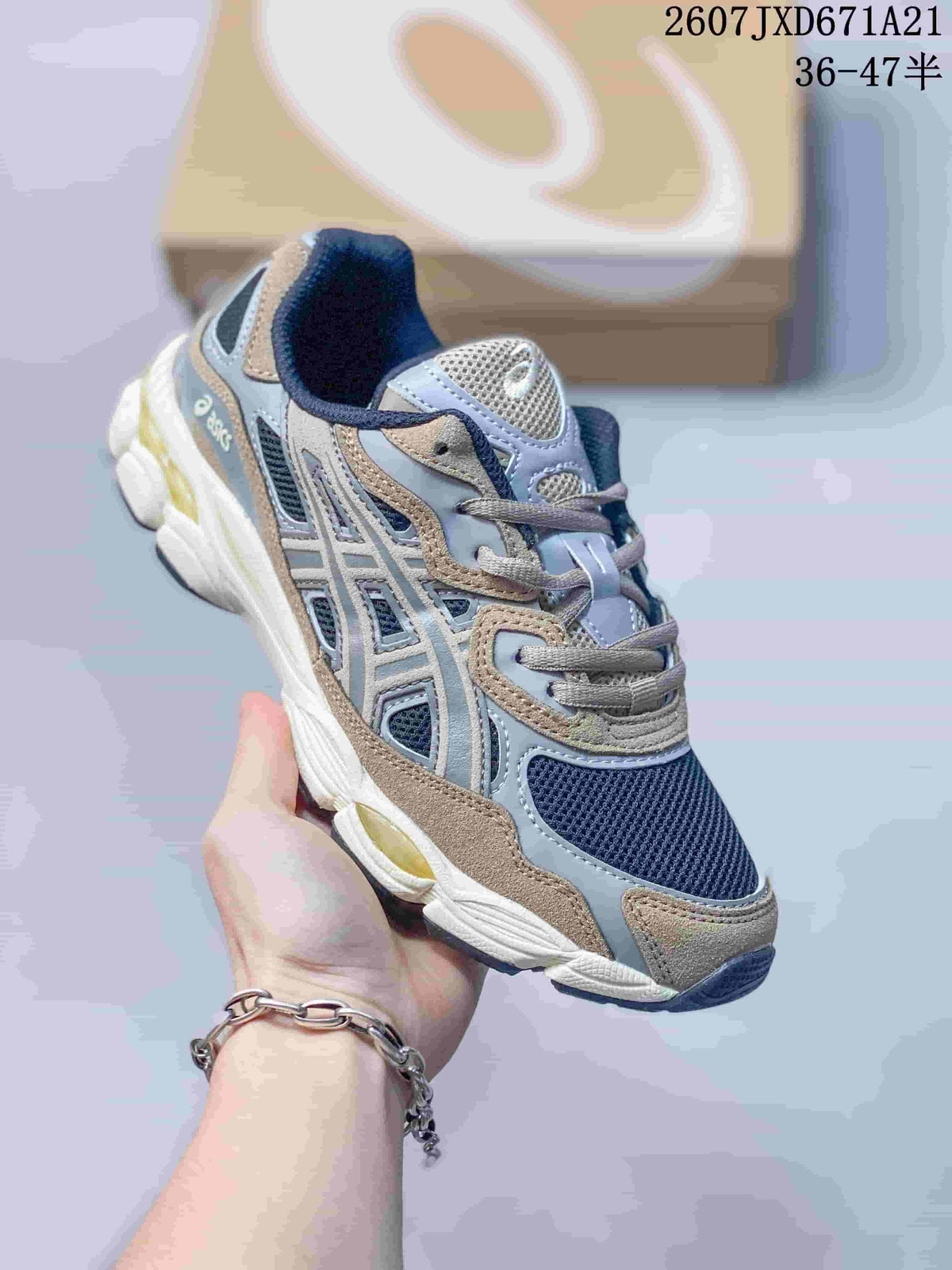 Angled side view of the Asics GEL-Kayano 14 sneaker showing the layered upper, mesh panels, and outsole.