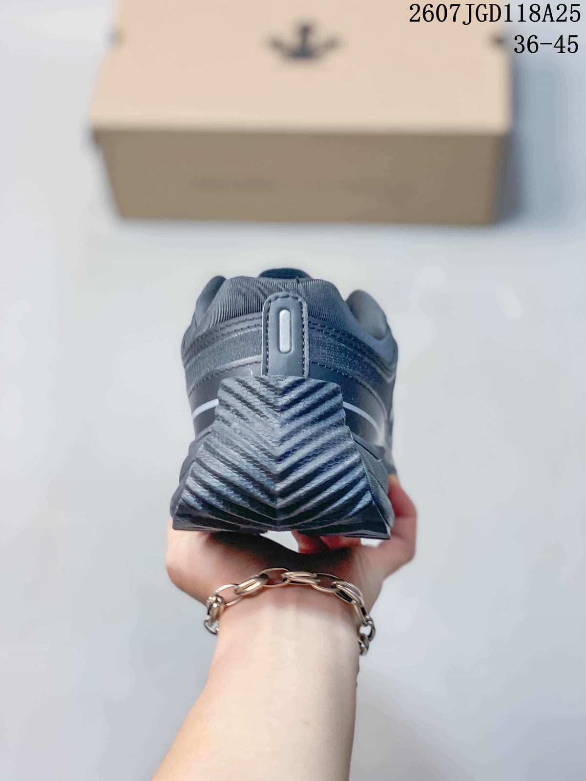 Rear view showing the padded heel area and layered tread pattern on the outsole.