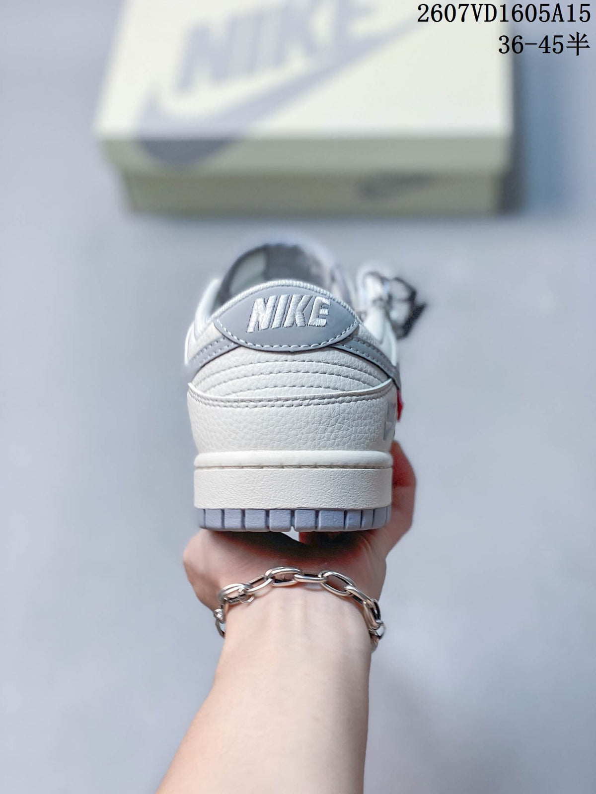 Rear view showing the textured heel panel, Nike branding, and gray outsole.