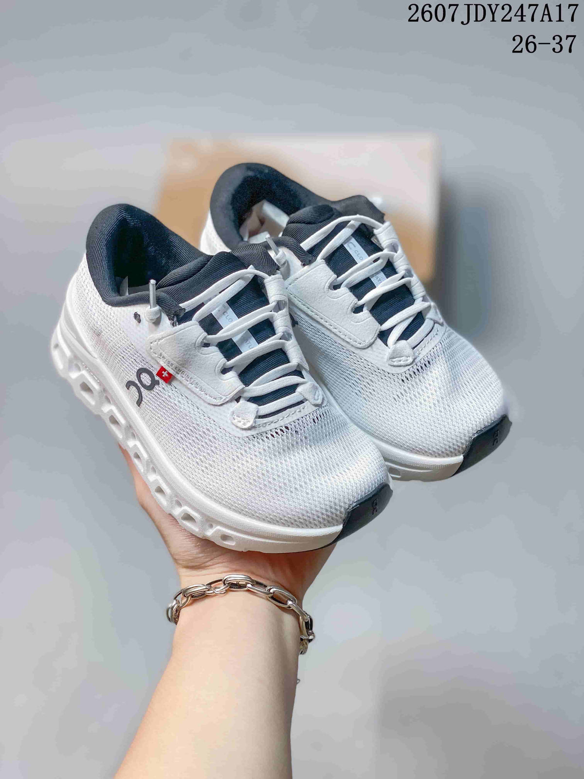 Pair of white On low-top running sneakers shown from above, with dark collars and segmented soles.