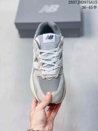Top view showing the perforated toe area, laces and tongue logo.