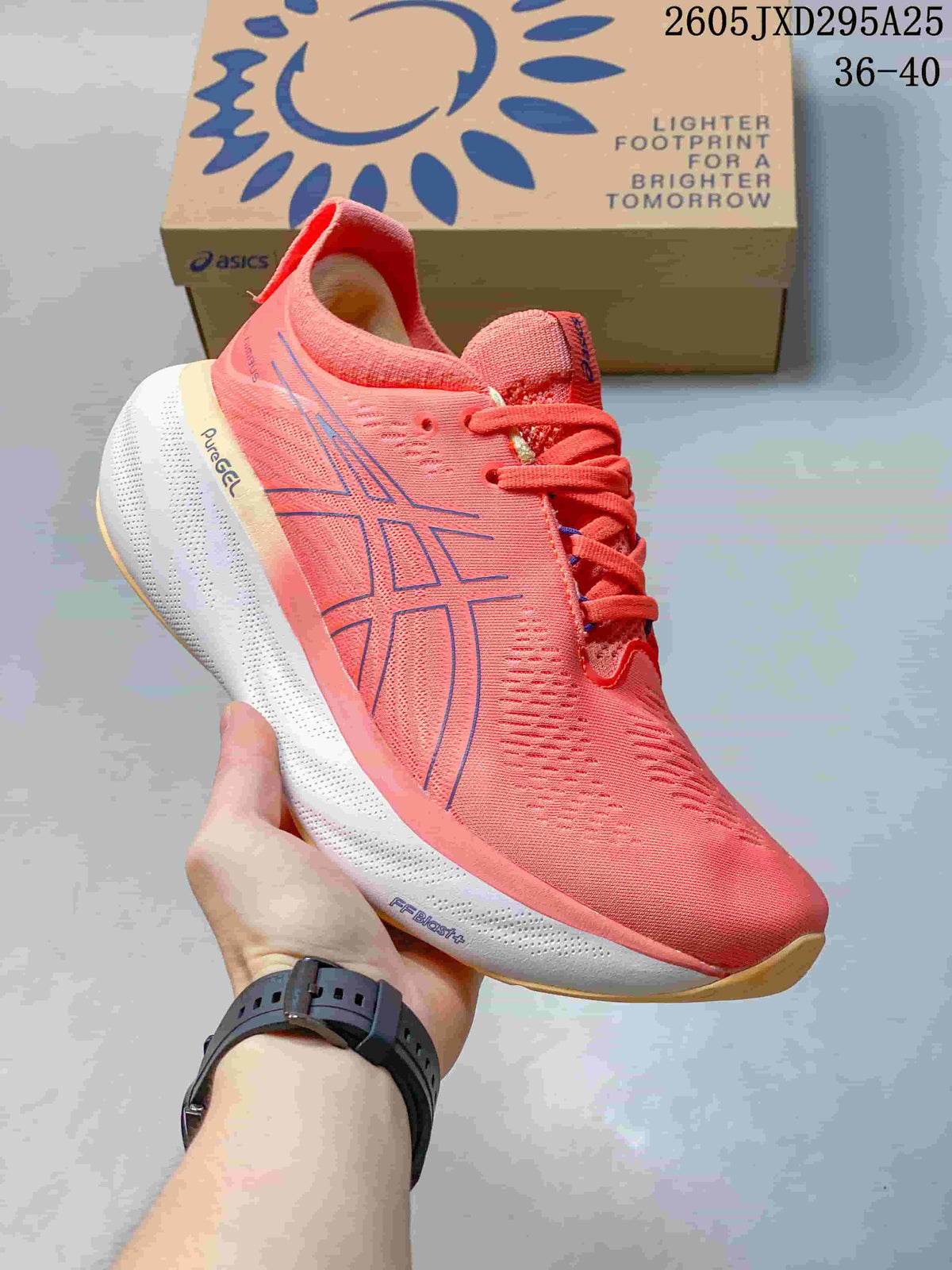 Close side view showing ASICS detailing and the GEL-CUMULUS 26 shoe markings