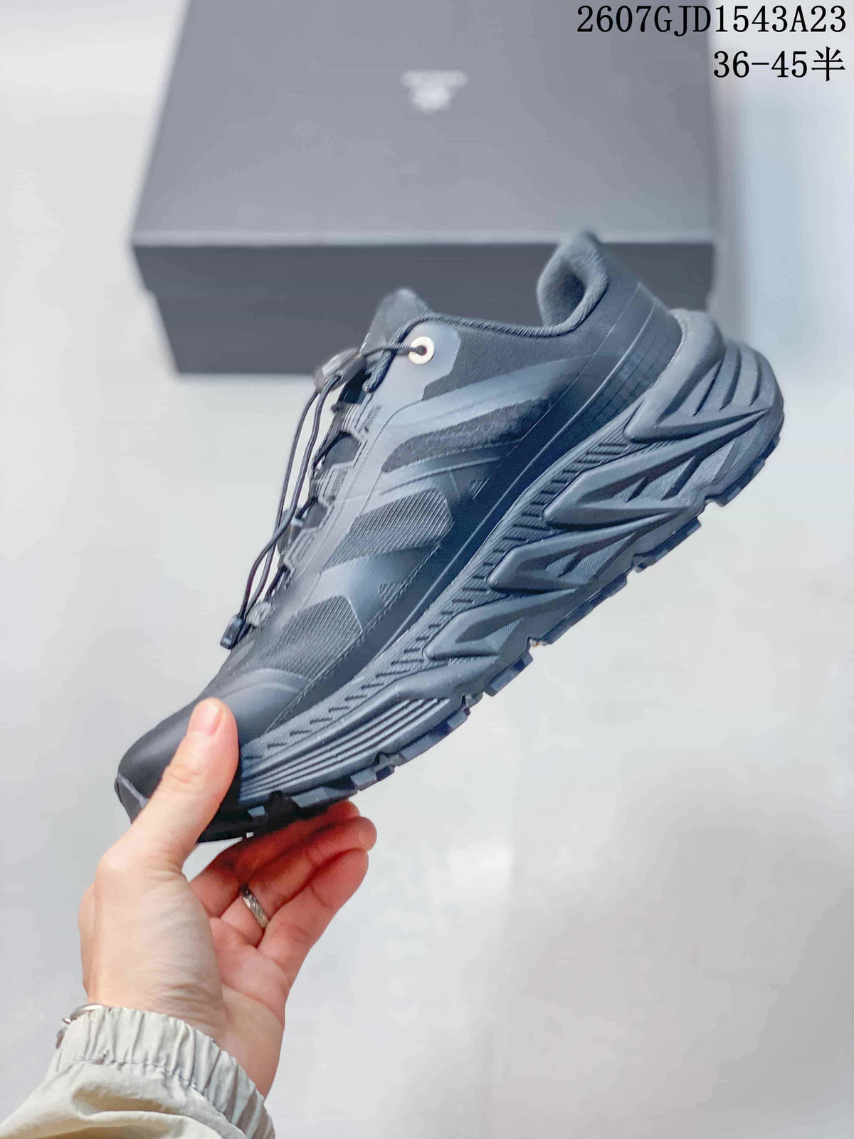 Side profile highlighting the low-top shape, mesh upper panels, reinforced overlays, and lugged sole.