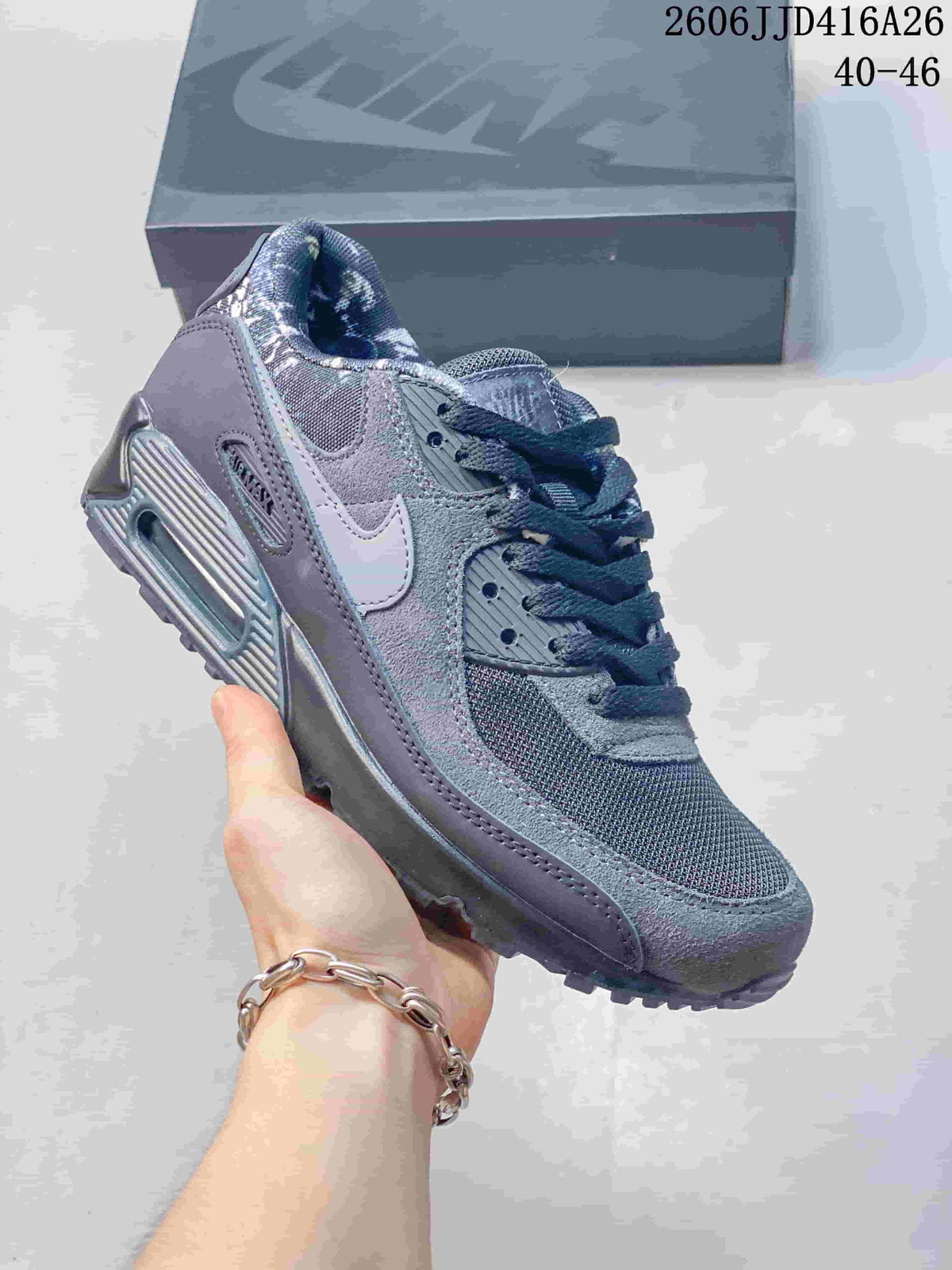 Dark gray Nike Air Max 90 sneaker with contrasting white Swoosh