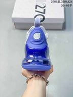 Rear view showing the prominent blue heel unit on a white Nike Air Max 270 sneaker.