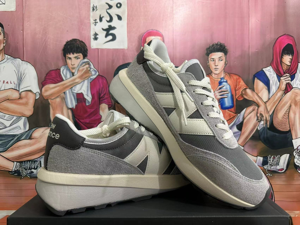 New Balance U370 sneakers arranged together to show their layered side panels