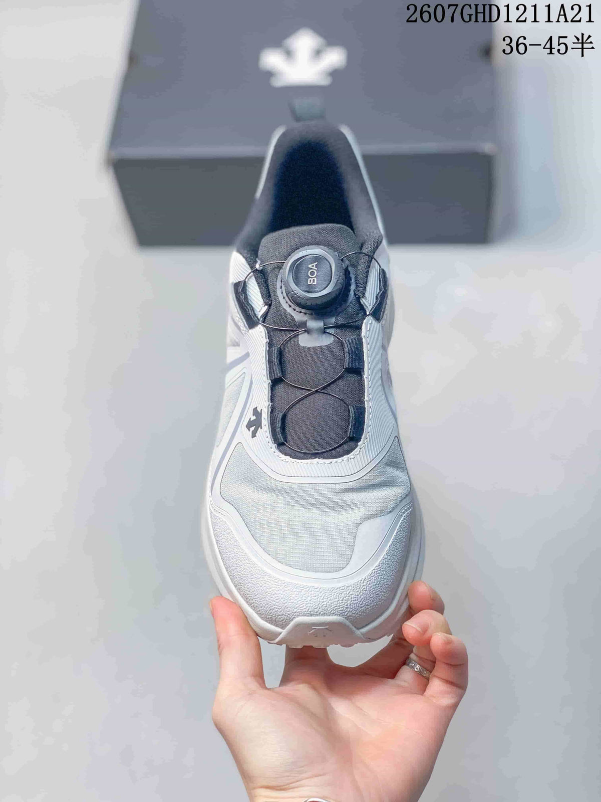 Top view of the sneaker showing the BOA dial closure, dark padded tongue, and structured toe area.
