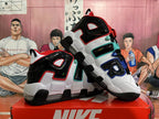 Pair of basketball sneakers displayed at an angle, showing the AIR side design and multicolor accents.