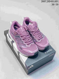 Pair of purple Adidas Terrex low-top sneakers displayed on a shoe box