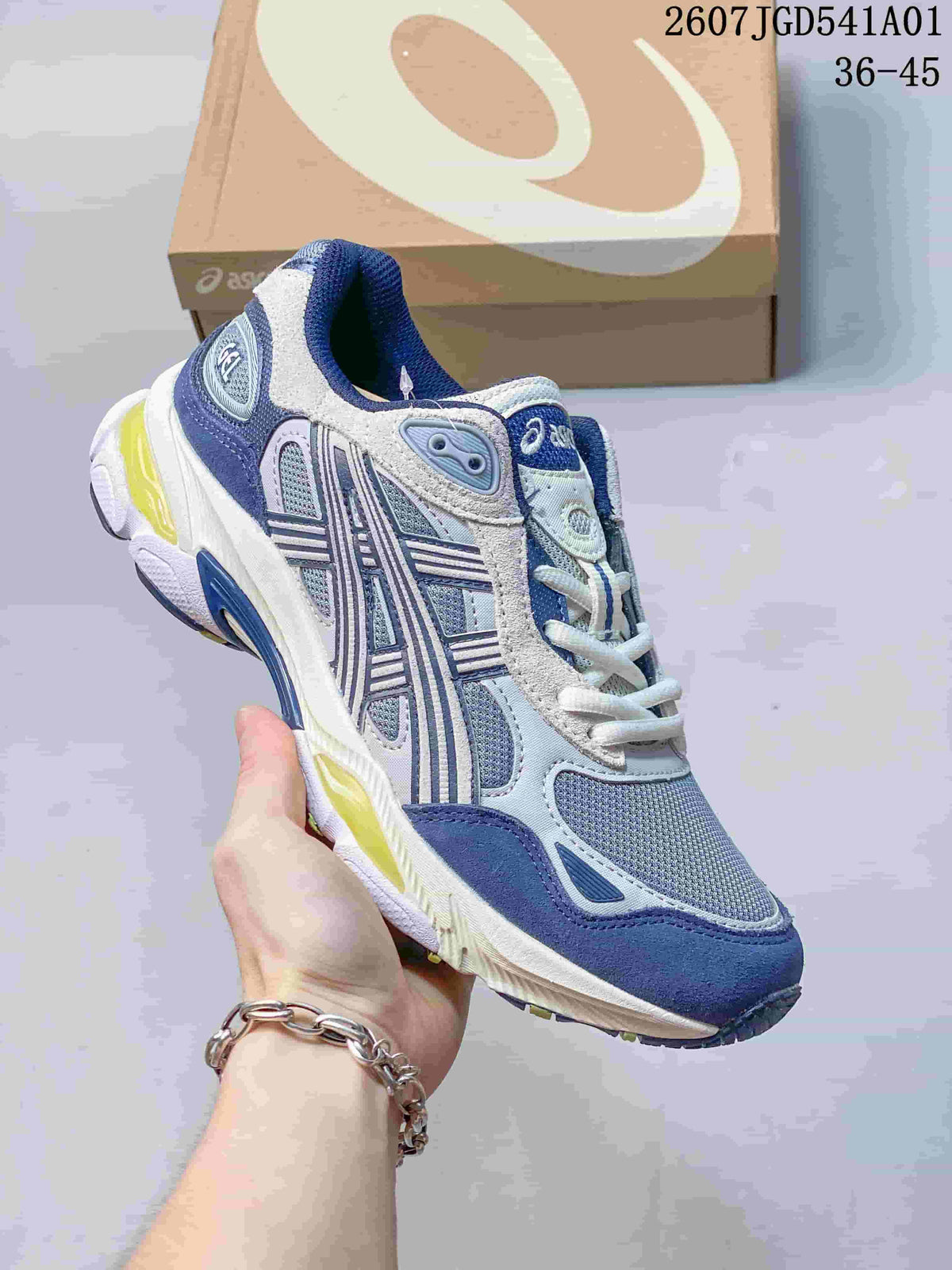 Angled side view of the blue and gray sneaker with contrasting sole accents