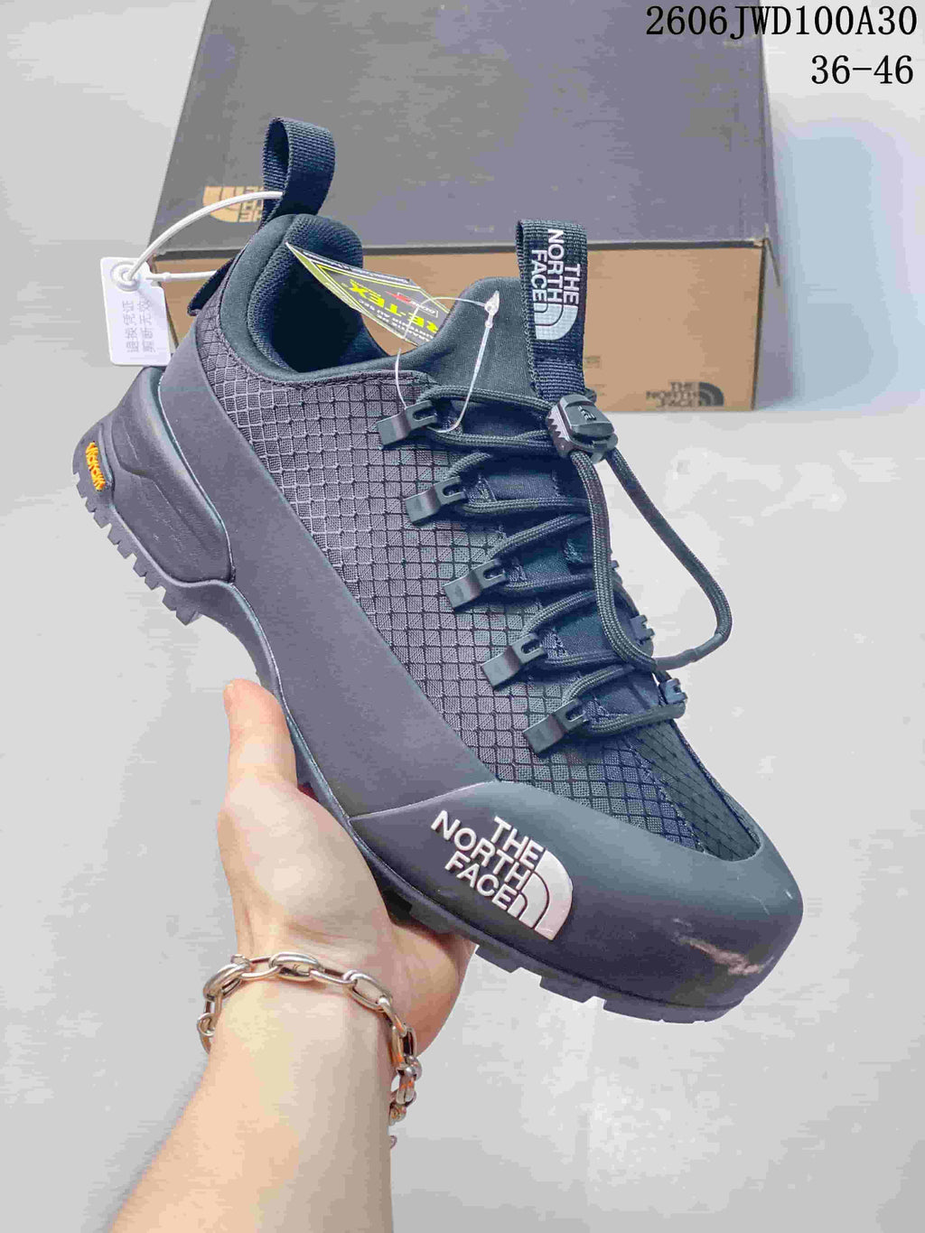 Dark gray low-top The North Face Glenclyffe shoe with cord-style laces and lugged outsole.
