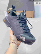 Dark gray low-top The North Face Glenclyffe shoe with cord-style laces and lugged outsole.