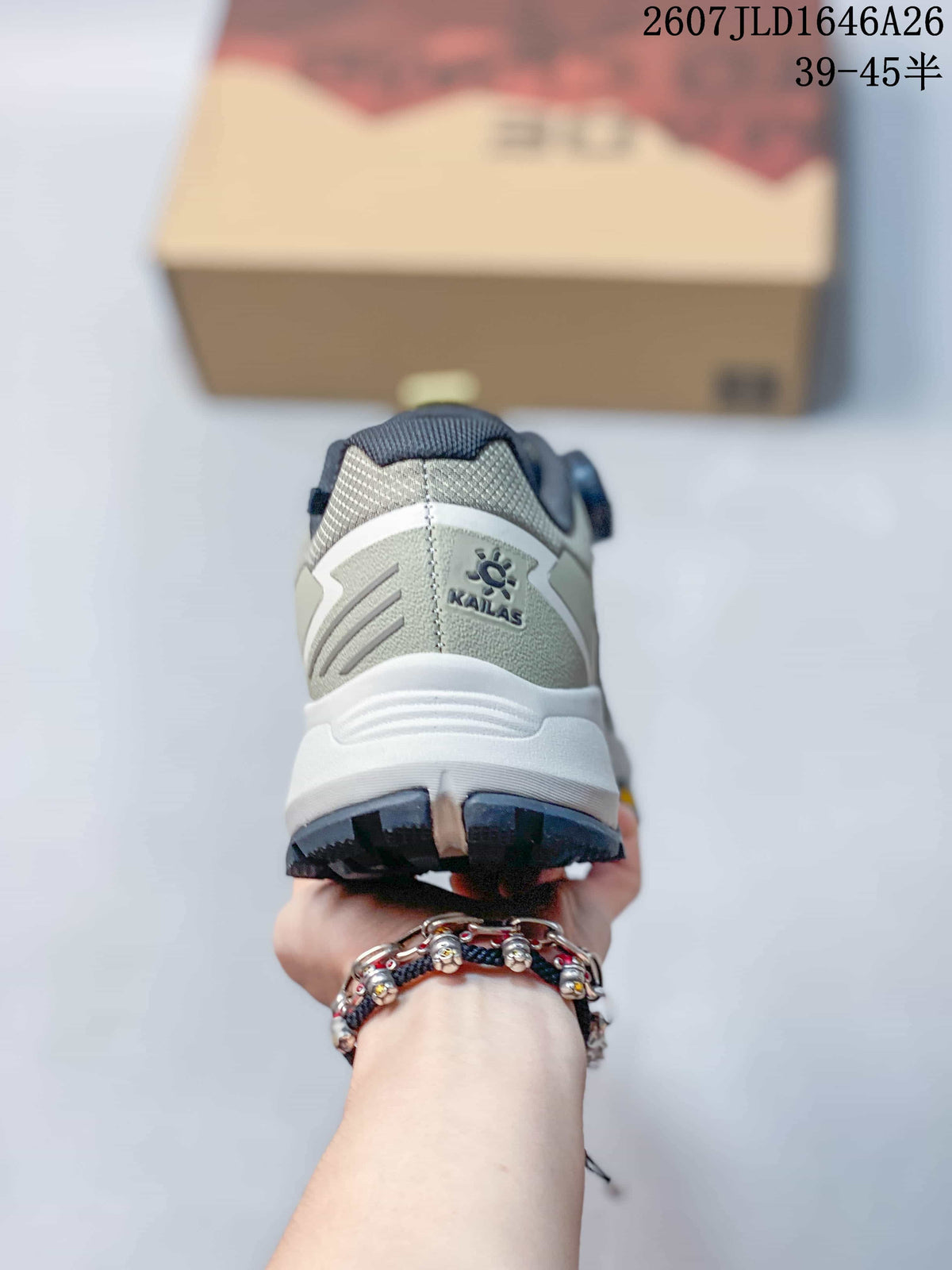 Rear view of a KAILAS trail shoe showing the heel counter, padded collar, white midsole, and dark lugged outsole.
