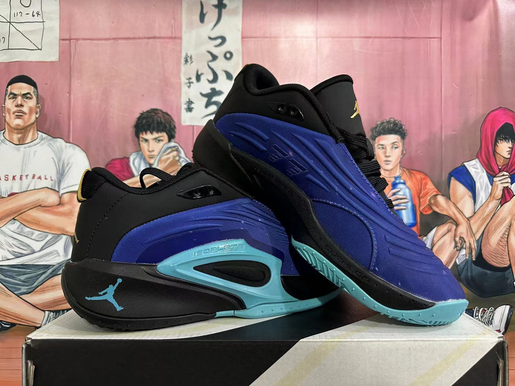 Pair of black and blue Jordan basketball shoes shown from the side.