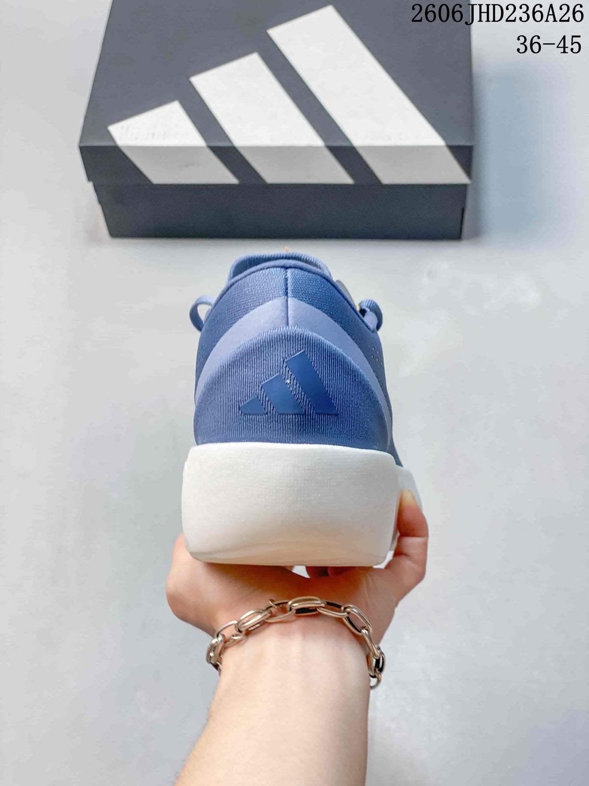 Rear view of the blue shoe with adidas branding and a thick white sole.
