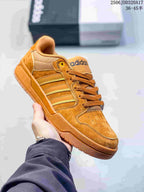 Brown adidas Entrap sneaker with tonal side stripes and a gum-colored outsole.