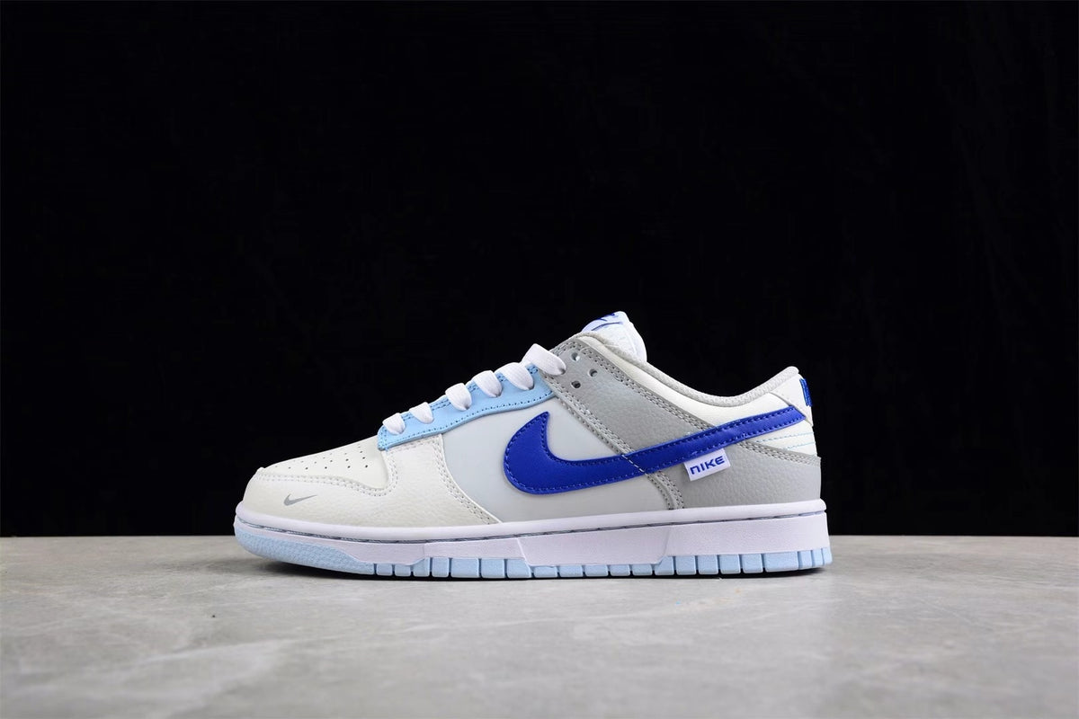 Opposite lateral view highlighting the royal blue side branding and light blue outsole.
