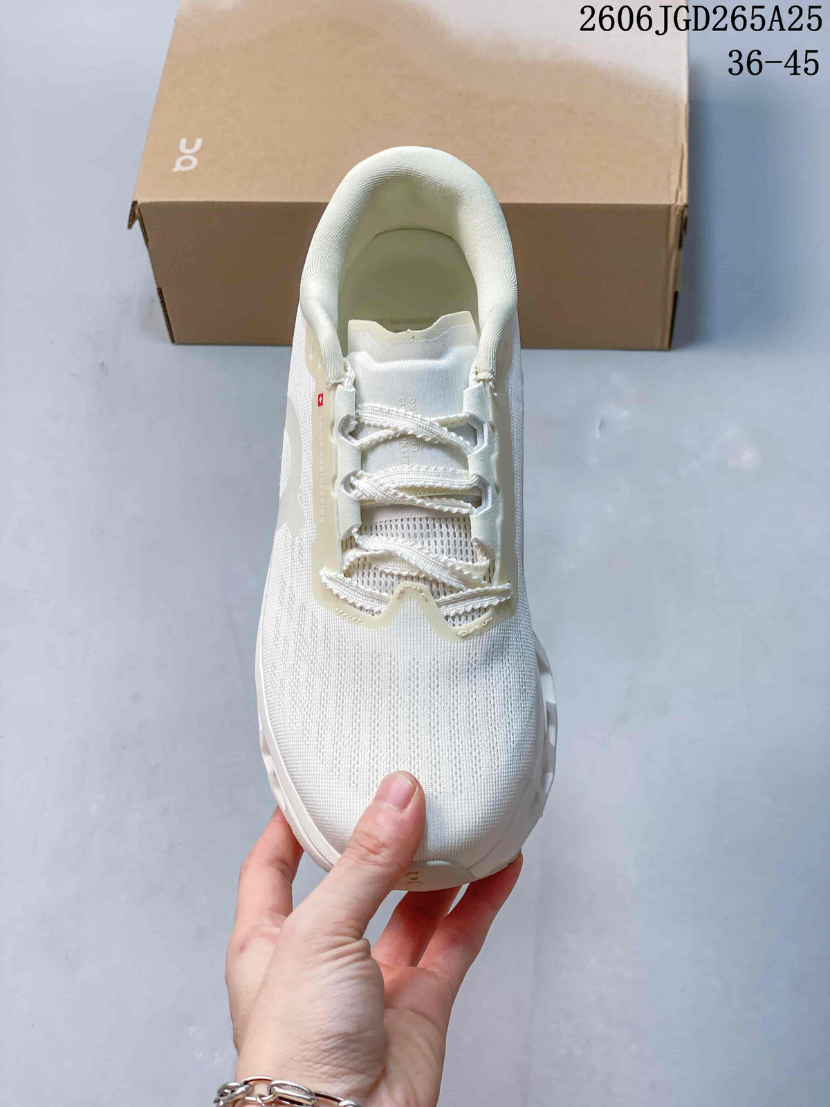 Top view of the white lace-up running shoe