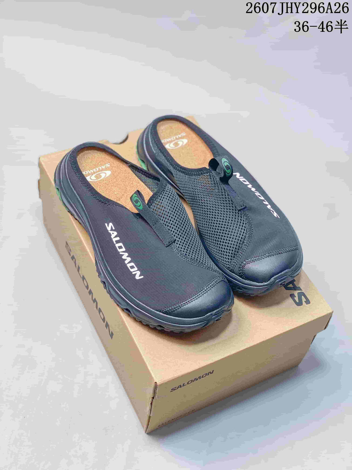 Black Salomon RX Slide 3.0 closed-toe slides displayed on a Salomon shoe box.