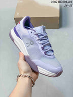 Angled side view of a light lavender and white On THE ROGER ADV Pro tennis shoe; image overlay shows code 2607JHD201A01 and sizes 36–45.