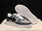 Angled view showing the sneaker upper and the star-patterned outsole.