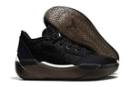 Side view of a black Jordan 39 shoe with the outsole visible.