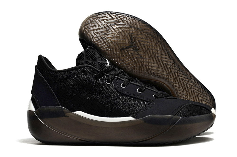 Side view of a black Jordan 39 shoe with the outsole visible.