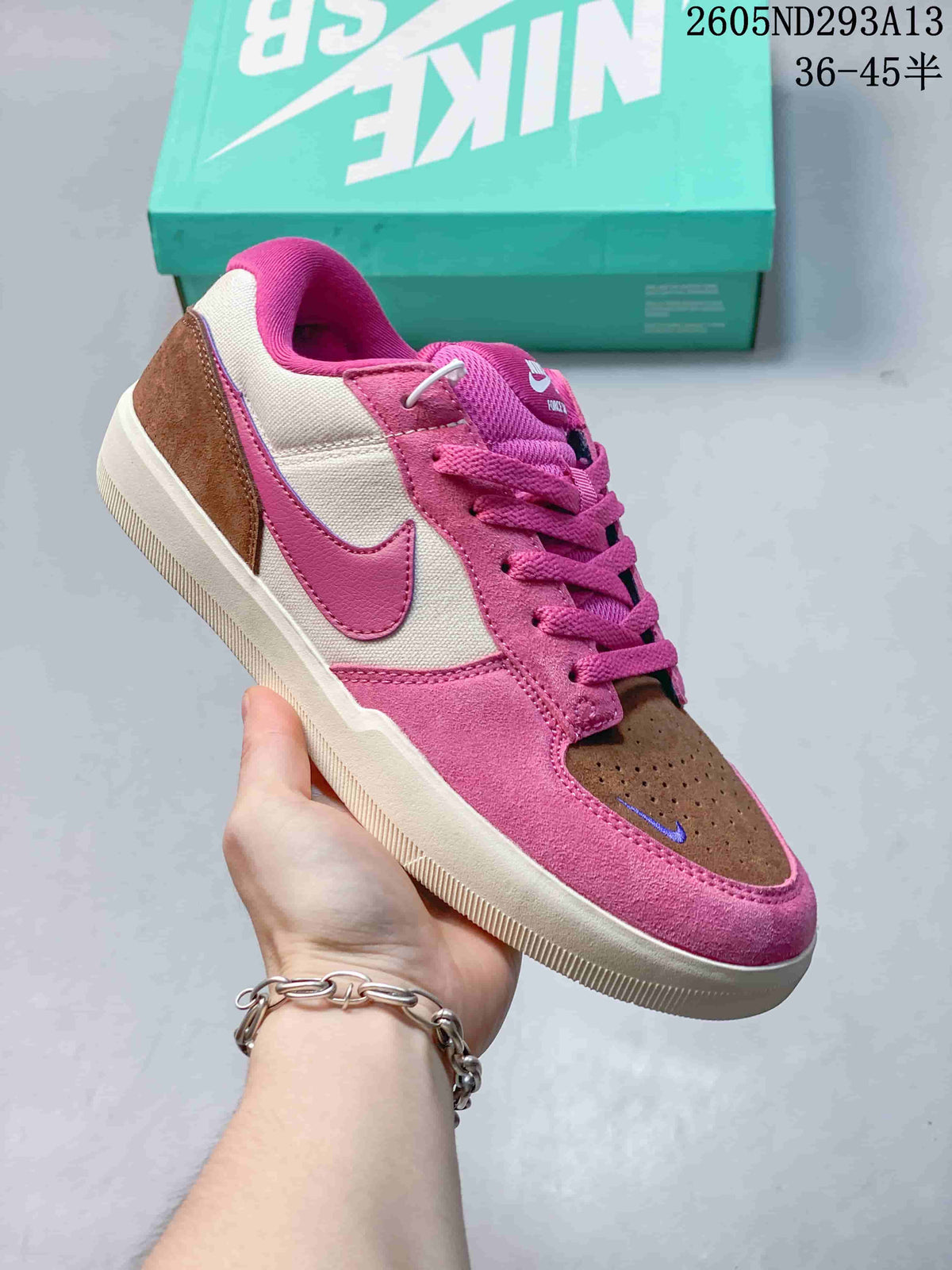 Pink, brown, and off-white Nike SB Force 58 low-top shoe.