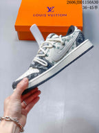 Side view of a low-top sneaker with patterned panels and a side swoosh