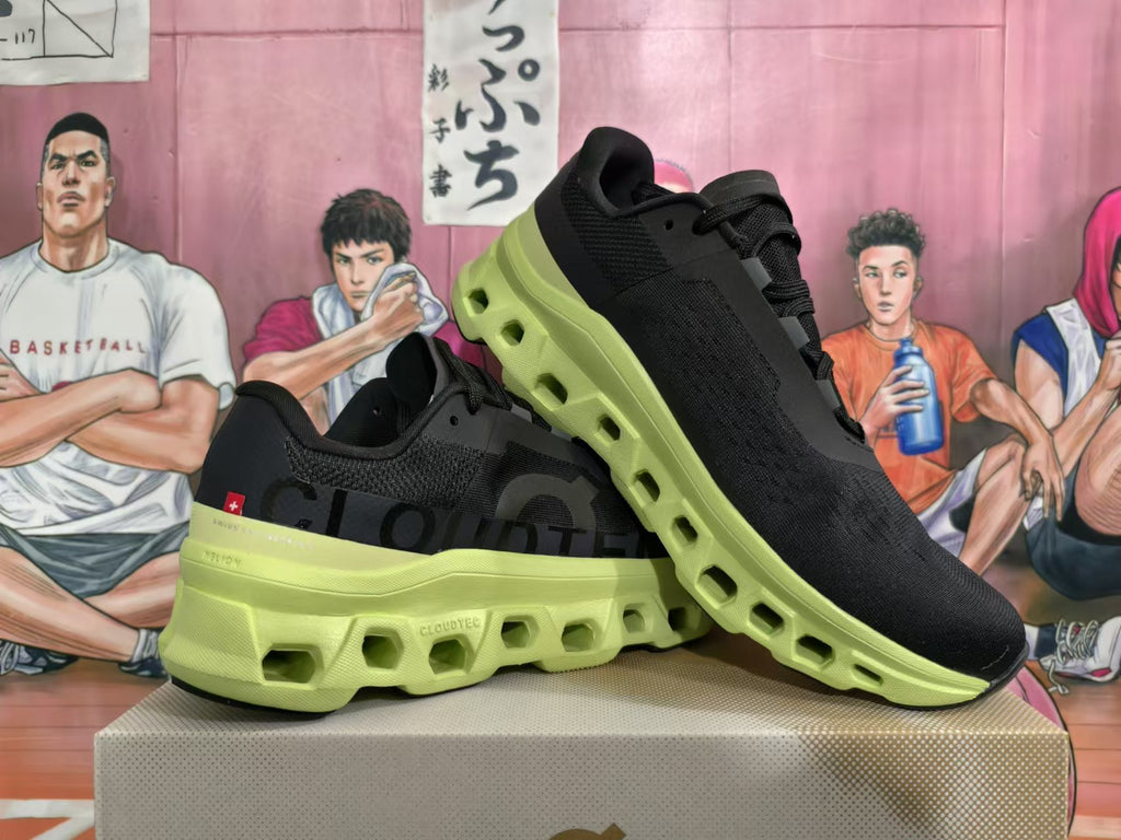 Pair of black sneakers with lime-green soles, shown at an angle