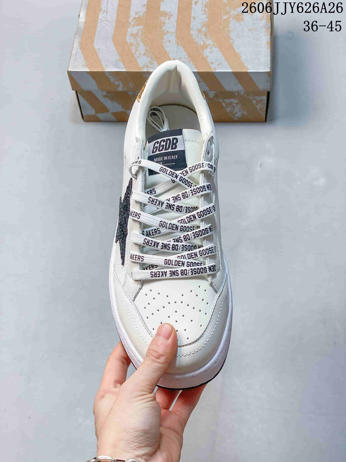 Top view of the white sneaker showing perforated toe panels, branded laces and the tongue label.