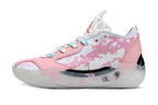 Side profile of a pink and white Jordan 39 shoe.