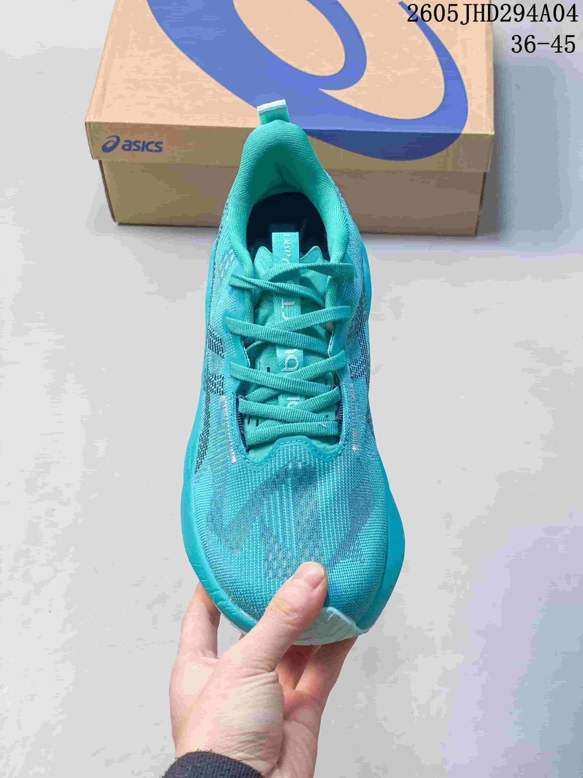 Top view of a turquoise lace-up running shoe