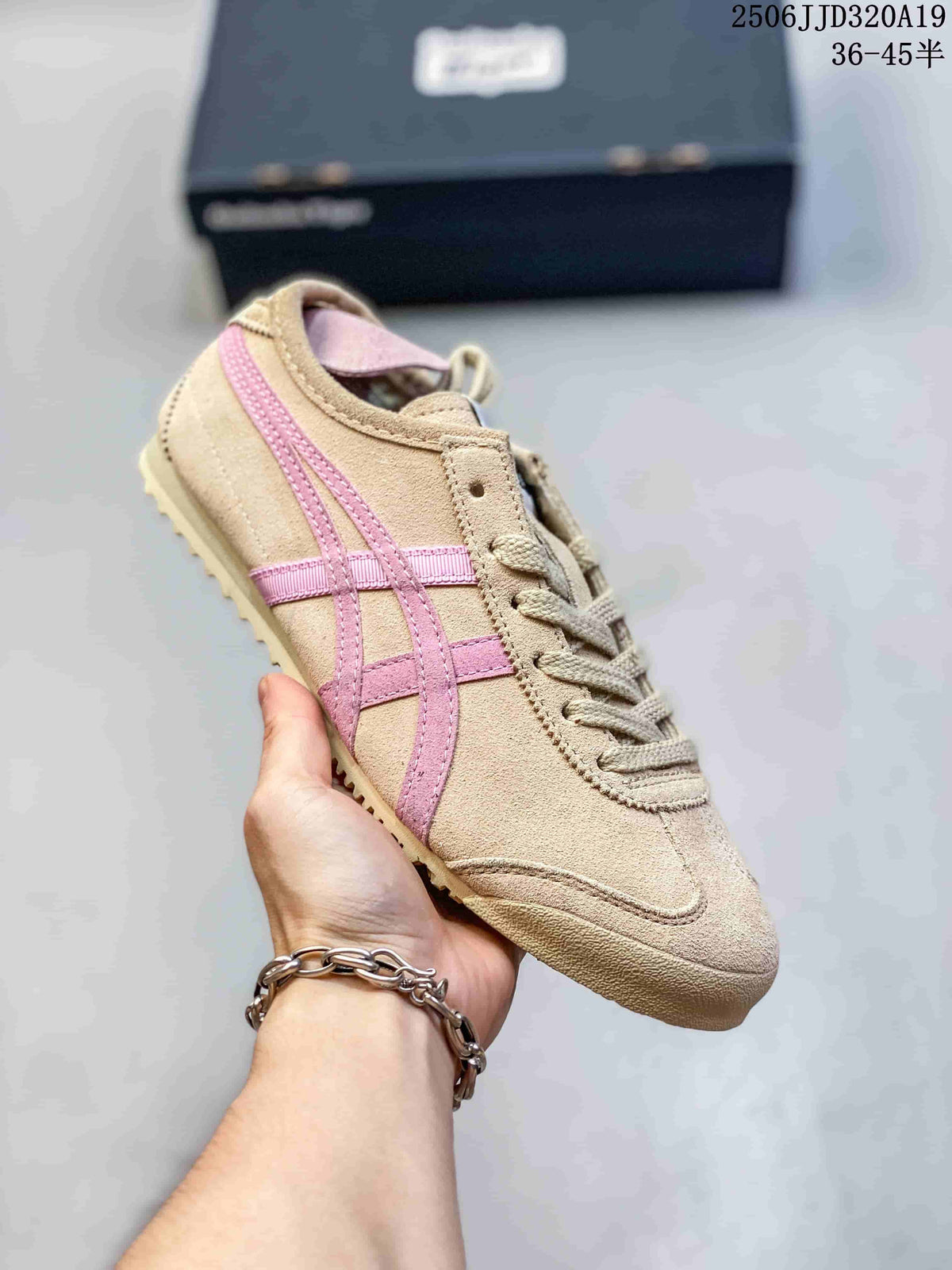 Angled side view showing the beige and pink color combination, layered side stripes, and textured sole.