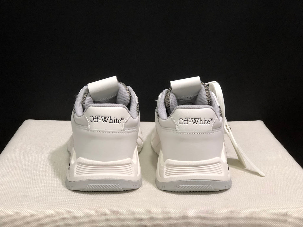 Rear view showing padded heels and Off-White branding on both heel tabs.