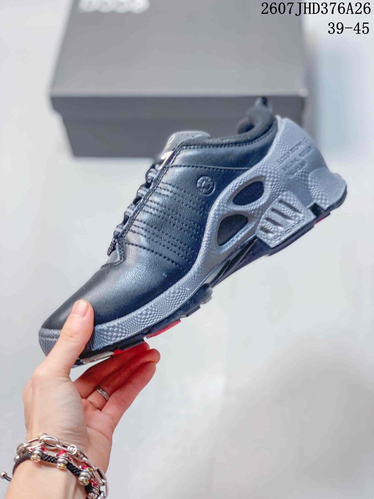 Side profile of the ECCO sneaker showing the perforated upper, lace-up design, and layered textured sole.