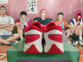 Rear view of white and red Anta KT 10 basketball shoes showing the heel and red outsole details
