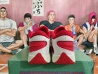 Rear view of white and red Anta KT 10 basketball shoes showing the heel and red outsole details