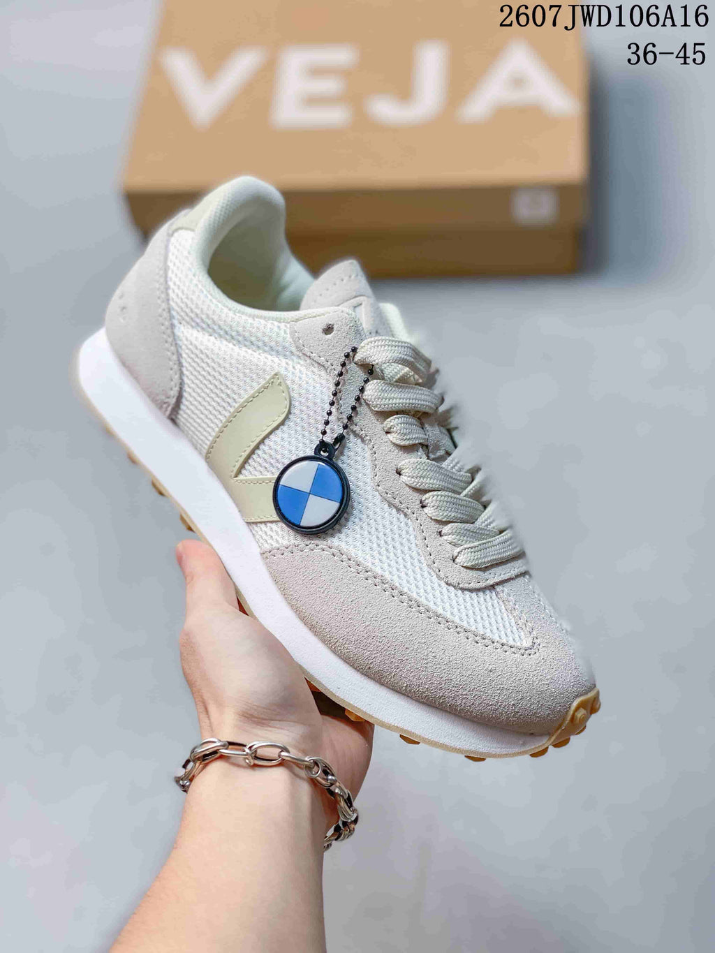 Off-white VEJA Rio Branco sneaker with a pale V logo, white laces and a textured outsole.