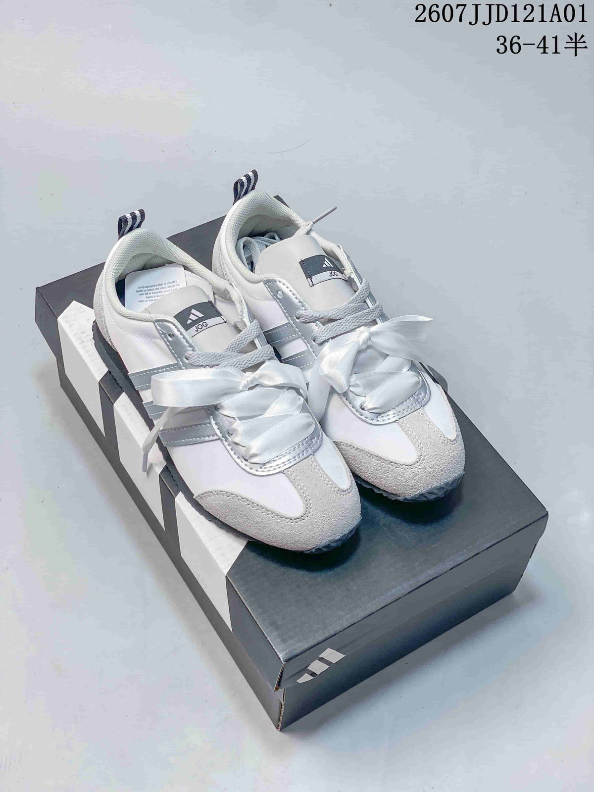 White and silver adidas JOG 2.0 sneakers with ribbon laces