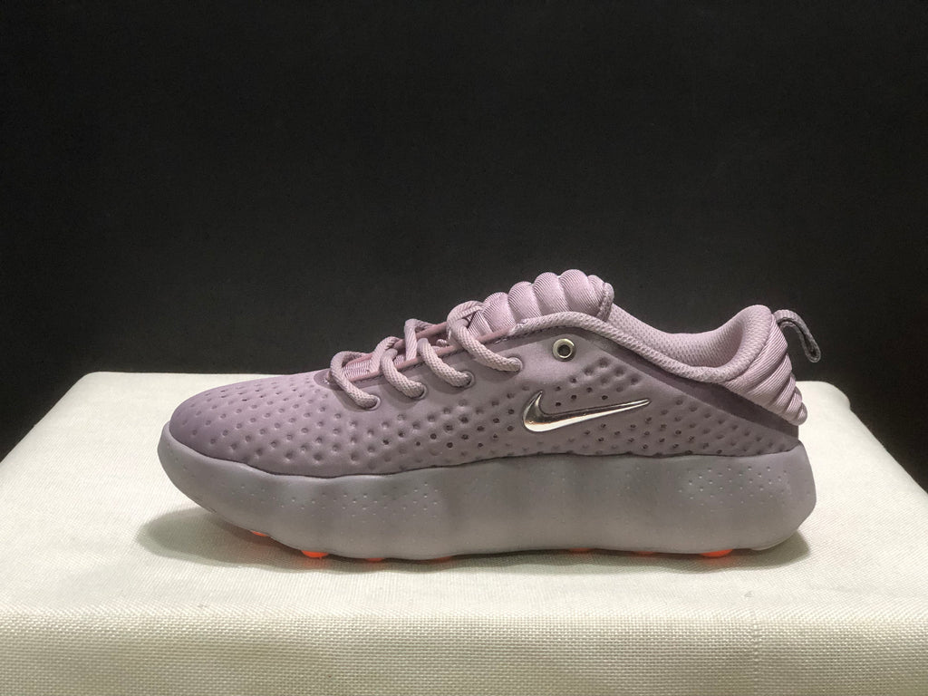 Side profile showing the perforated upper, metallic Swoosh and thick sculpted sole.