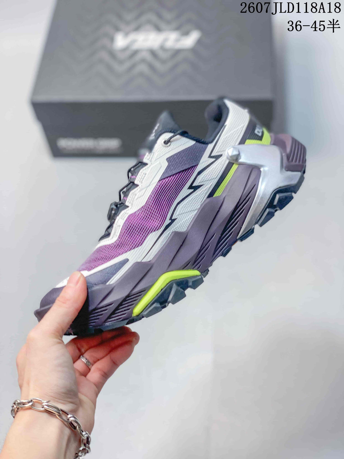 Side profile highlighting the low-top shape, mesh-look upper, BOA dial and layered sole.