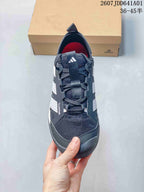 Front view showing the mesh-look upper and lace-up closure