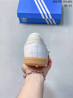 Rear view showing the heel panels and gum-colored sole