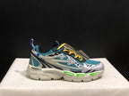 Side view of one sneaker showing the Off-White marking, teal mesh, contrasting overlays, and green sole details.