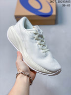 Angled side view of the white ASICS running shoe showing the mesh upper, side branding and thick midsole.