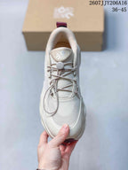 Top view showing the textile-style upper, quick-lace system, and padded tongue.
