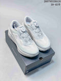 Pair of white Descente D.F. Wire 3.0 sneakers displayed on a branded shoebox, with BOA dial closures and the style code visible above.