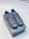 Pair of black ECCO outdoor sneakers displayed on an ECCO shoebox, with style code 2607JWD518A18 and size range 38–45 visible above.